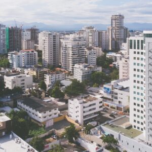 an aerial view of a city with tall buildings
